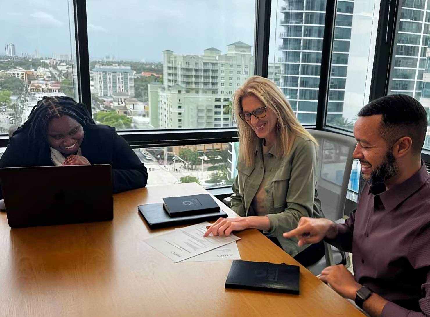 Lori Adelson in her office with others